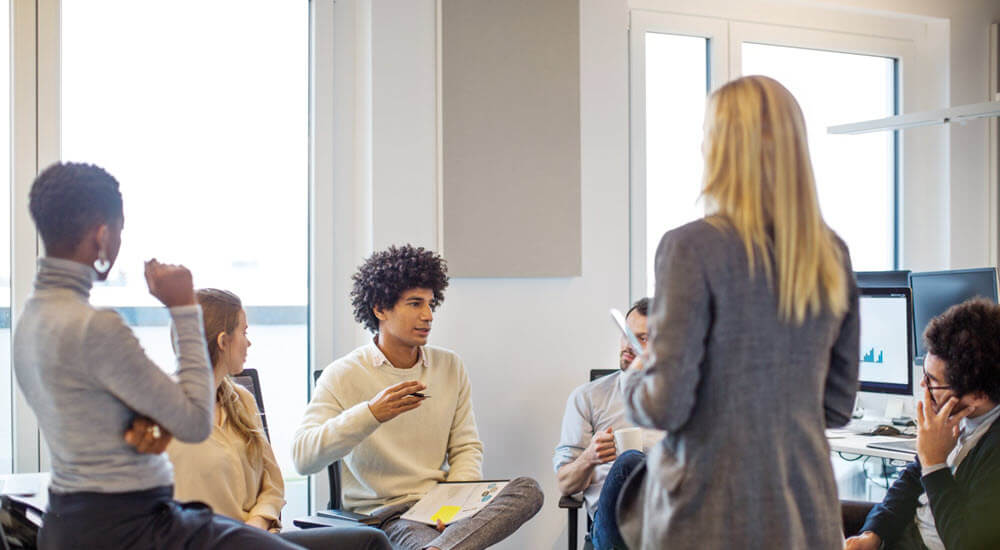 Young man leading a new business meeting